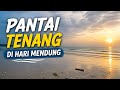 “Pantai Tenang di Hari Mendung”