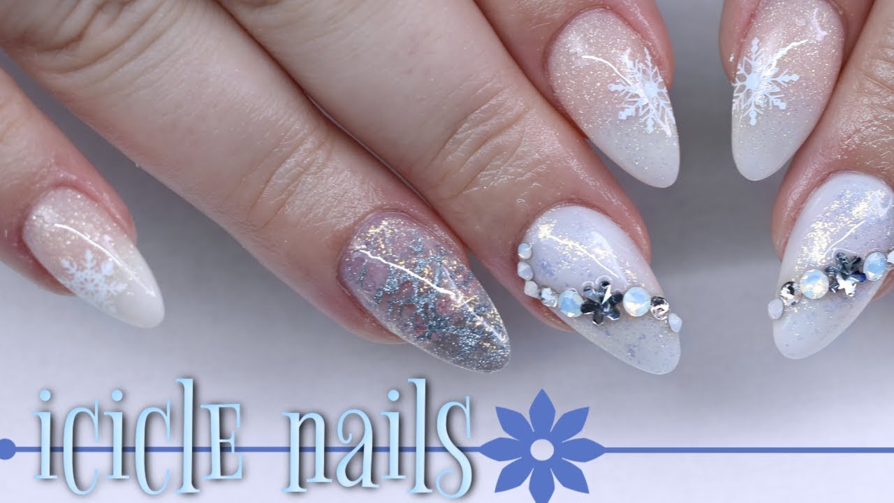 1. Blue and Silver Winter Nail Design 2024 - wide 4