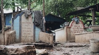 Grave conditions for Cambodians living among tombstones