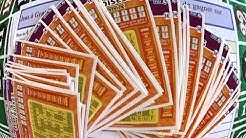 Gratter un carnet à 150€ de Mots croisés, Soit 50 tickets grattés. JEUX FDJ Illiko