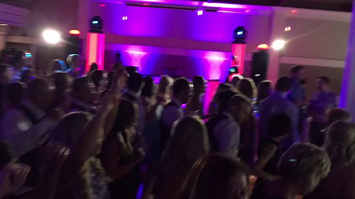 Packed dance floor with Black Tie Entertainment at Occasions Party Center in Akron