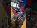 Playtime in the RV #rv #cat #rvcat #cattoy #silly #rvlife #feathers #blue #yellow #couch #purple