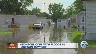 Neighbors cope with floods in Harrison Township