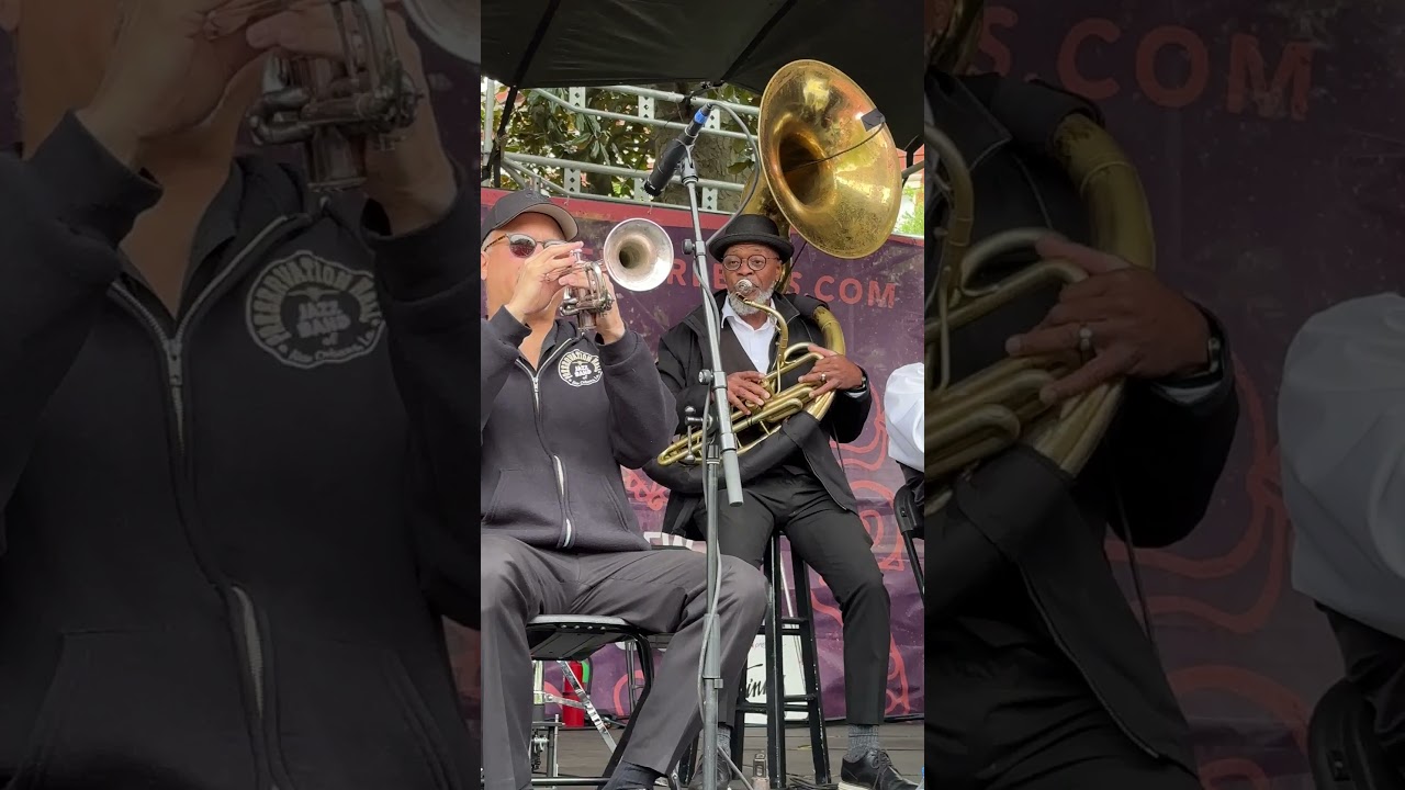 Preservation Brass Band playing in Jackson Square for the 2024 French Quarter Festival New Orleans