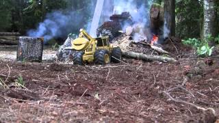 Yarding logs and stoking the fire with the Tigercat Skidder