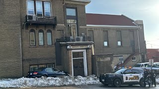 Two-vehicle crash sends car into Duluth building; drivers treated for minor injuries