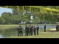 First Responders pull woman from car after it plunged into Pompano Beach canal
