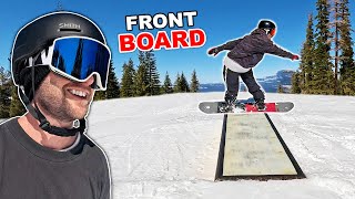 Teaching Friend How To Frontside Boardslide on a Snowboard