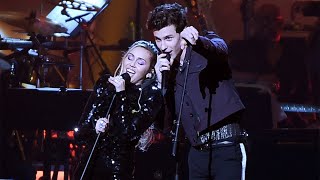 Shawn Mendes and Miley Cyrus performing \\