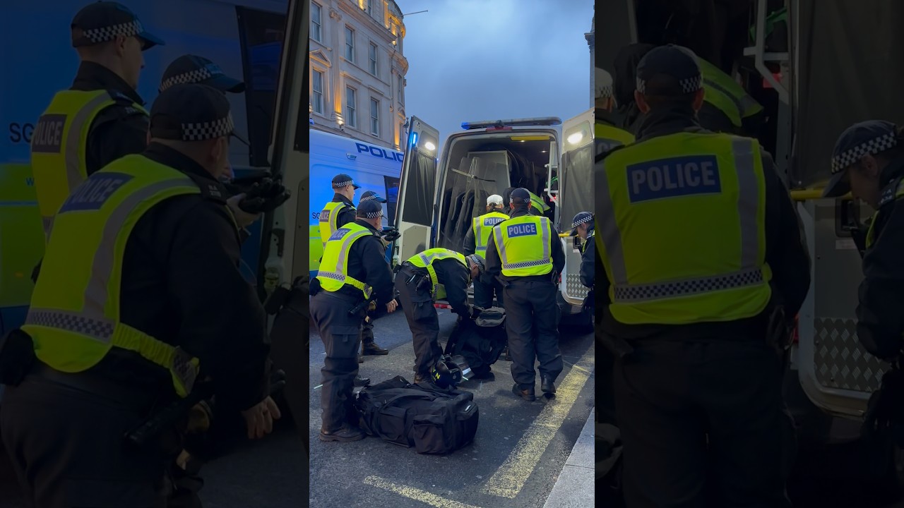 Met Police officers preparing protective gear amid protests 