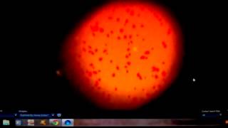 Red fire balls/streaks of red in space!!