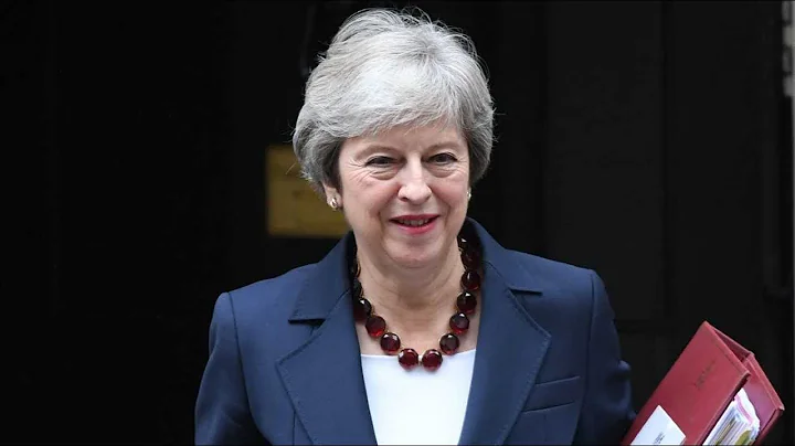 Theresa May addresses the House of Commons after t...