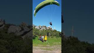 Paraglider lands on a wall