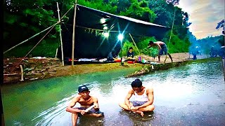 camping by the river - making a large shelter from plastic,