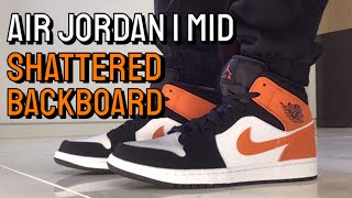 air jordan 1 mid shattered backboard on feet