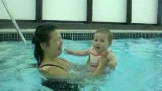 Sofia jumping in the pool