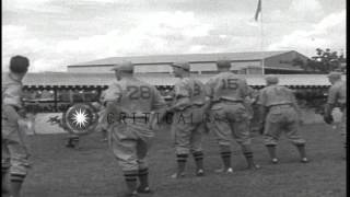 The Cincinnati Reds baseball team disembark from a flying boat and practice on a ...HD Stock Footage