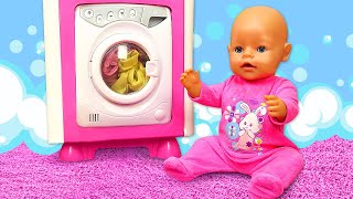 Baby dolls learn how to use a toy washing machine. Kids pretend to play with dolls & toys for girls.