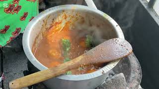 Mamas african pot prepared egg curry with jollof rice fried banana