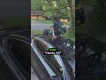 Man Jumps On Car To Avoid Dog
