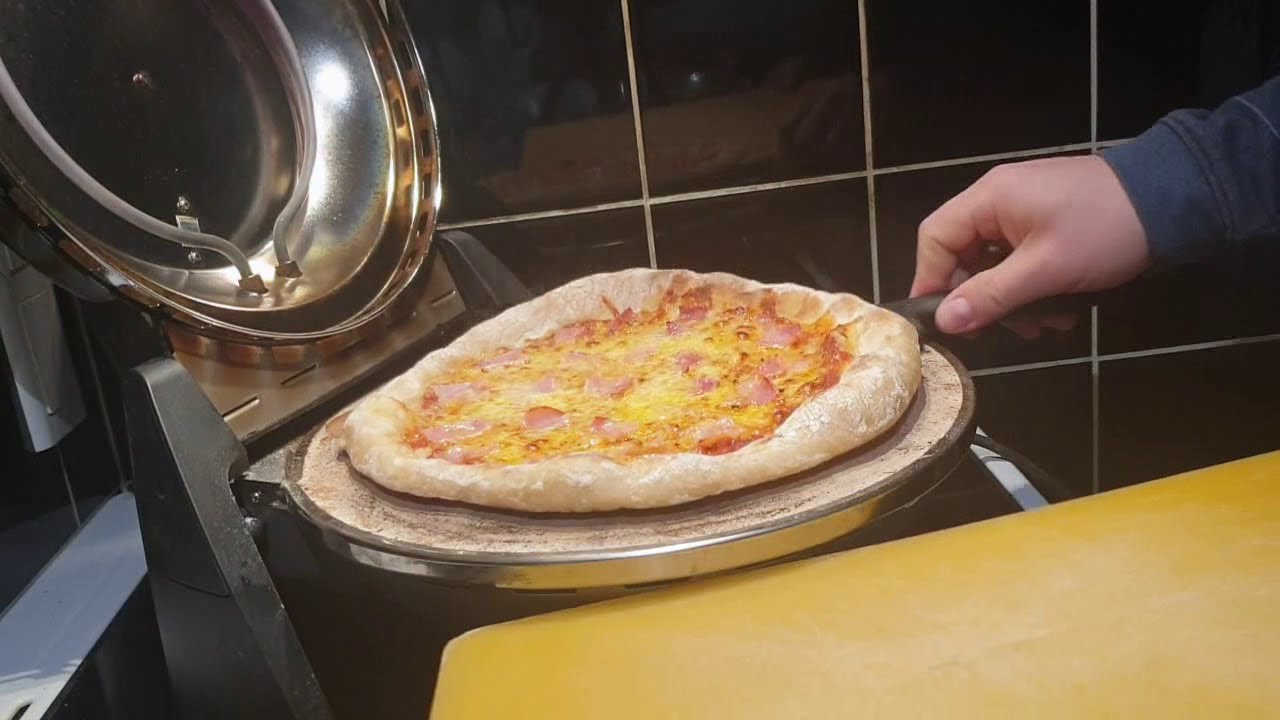 Shaping and cooking a homemade pizza - G3 Ferrari pizza maker 