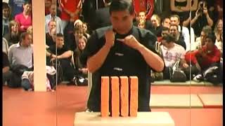 Da Sifu Louis Linn reverse knife hand brick-breaking technique in 2005.