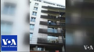 Malian Immigrant Scales Building To Rescue Child Dangling From Paris Balcony