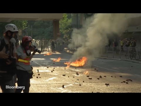 hong-kong-protesters-attack-police-officer