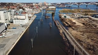 The mississippi river flooding in downtown davenport iowa on march
25th. take a quick tour down drive to see flood waters.