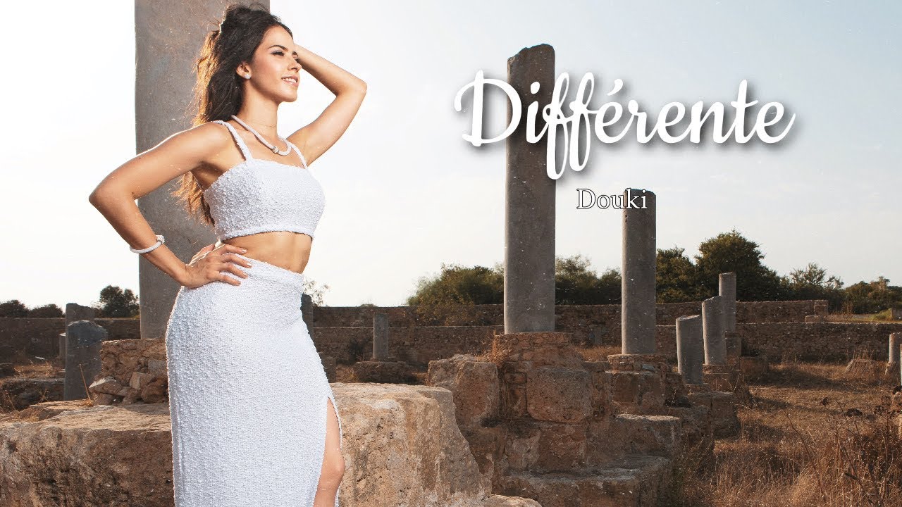 Watch Douki - Différente (Official Music Lyrics) on YouTube Watch Douki - Différente (Official Music Lyrics) on YouTube