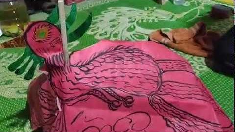 lễ cấp sắc dân tộc nùng.thầy tào đưa phụng ra xem chữ