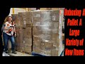Unboxing a pallet of home goods toys kitchen stationary and more check it out