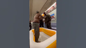 Homeless Man Takes A Shower On NYC Train