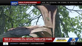 Signs of extensive storm damage still visible as tens of thousands remain without power in Greate