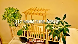 DIY Miniature Arbor Made from Popsicle Sticks! Materials are: popsicle/craft sticks, tooth picks, Elmer