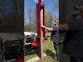 Pounding posts.