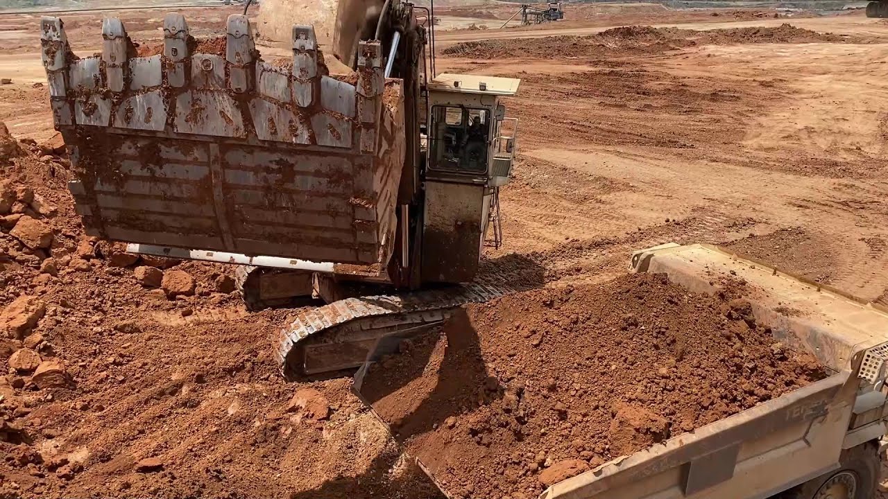 Huge Terex RH170 Shovel Excavator Loading Terex TR100 And Hitachi ...