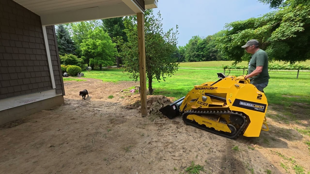 Mini dirt work with a mini skid steer. Baumalight TRL630D in action!