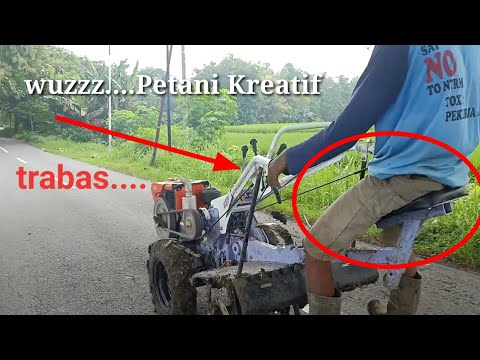 Video: Roda Untuk Traktor Berjalan Di Belakang 