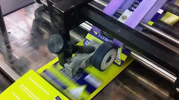 multifeeder tipping a card on to a 6page 3rd A4