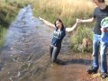 Mel takes a dip in a stream