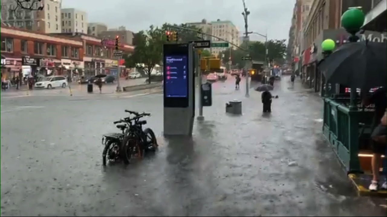 Heavy rain floods NYC as Tropical Storm Elsa nears - YouTube