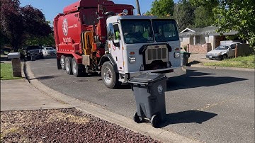 Roaring CNG Peterbilt 520 Labrie Automizer garbage truck