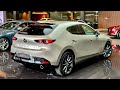 ( 2024 ) Mazda 3 Luxury Hatchback - Platinum Quartz color