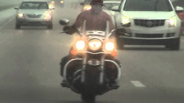 Biker Guy in Banana Hammock streaks down I-95 in Palm Bay, Florida  on a Yamaha