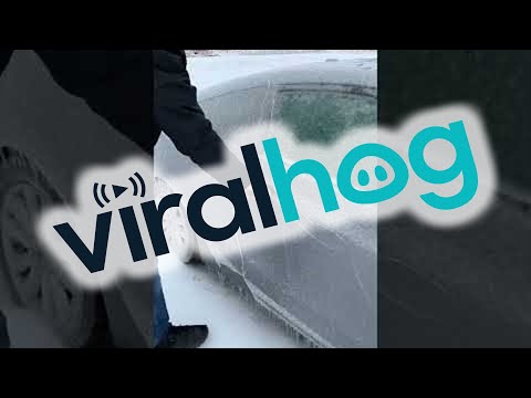 Opening the Door on an Ice-Covered Car || ViralHog