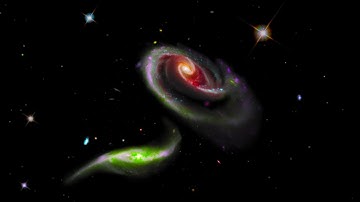 THE SPACE ROSE, ALSO KNOWN AS THE ARP 273 GALAXY PAIR, CAPTURED BY THE HUBBLE SPACE TELESCOPE