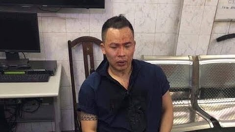 Hình ảnh Vũ Khắc Tiệp bị bắt, ngồi thất thần trong đồn công an gây xôn xao.