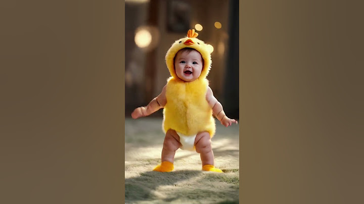 A baby chicken 🐥 and a baby banana 🍌 dancing.