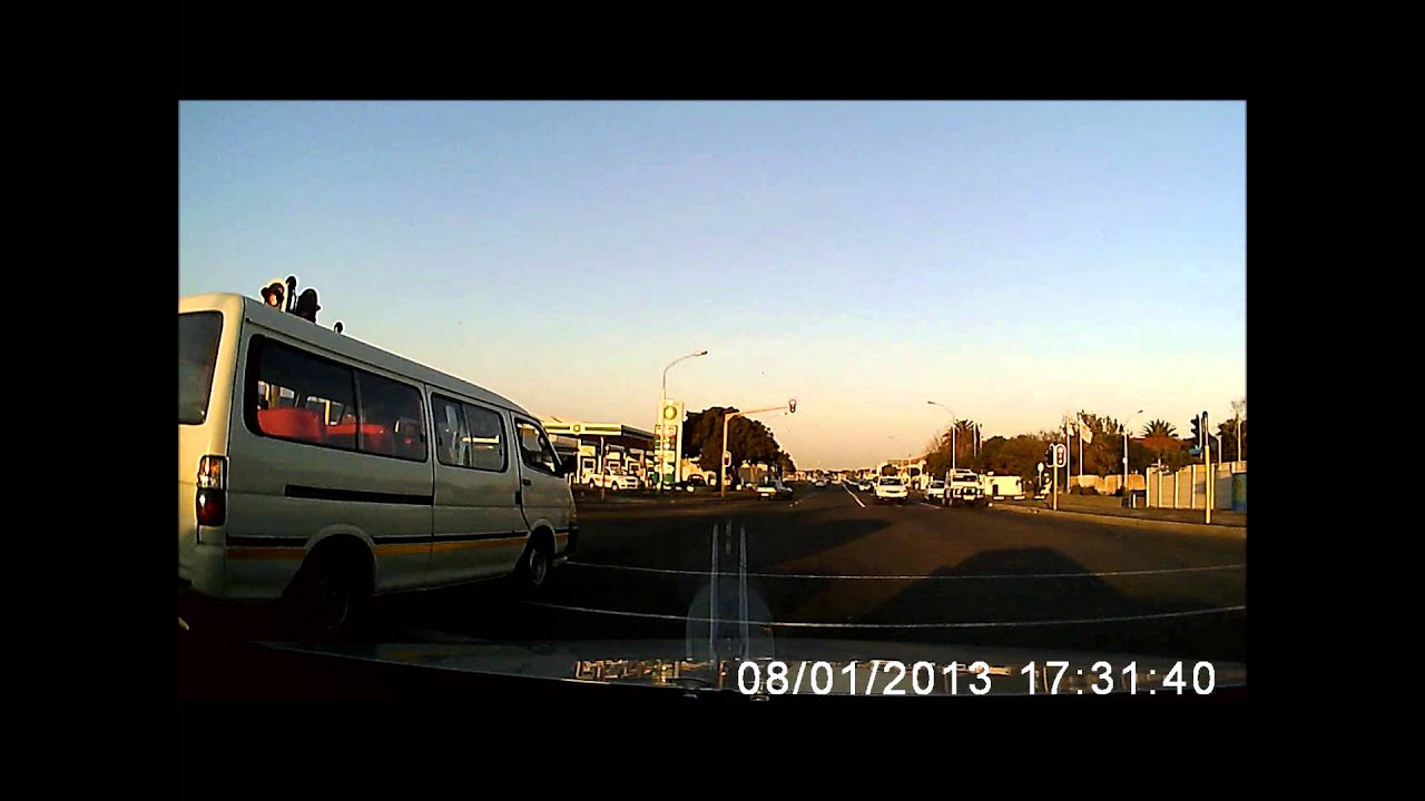 Taxi jumping traffic light - YouTube